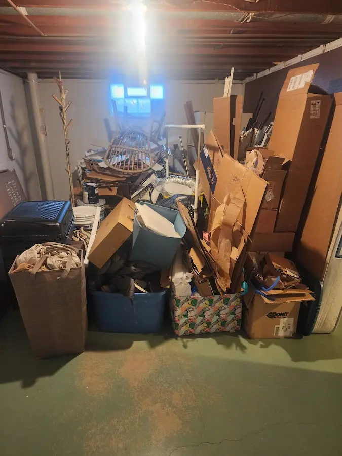 Roll-off dumpster container at job site for 20 Yard Dumpster Rental in Minster